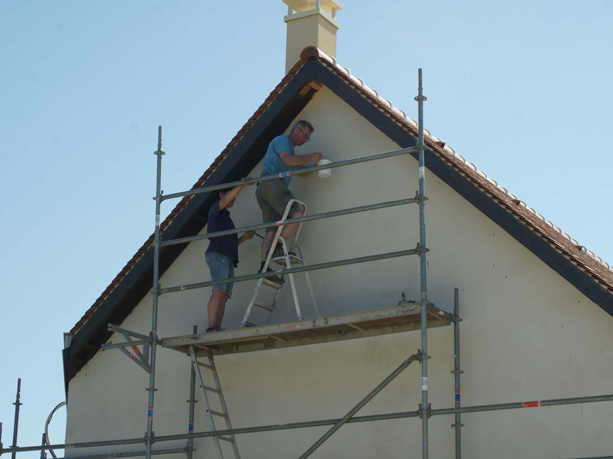 Stone façade of the family house in Villebichot before renovation